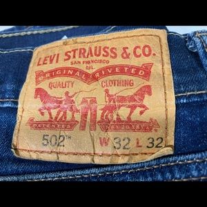 Levi’s 502 32x29 Dst taper fit straight leg jeans tag 32x32 has holes 0203